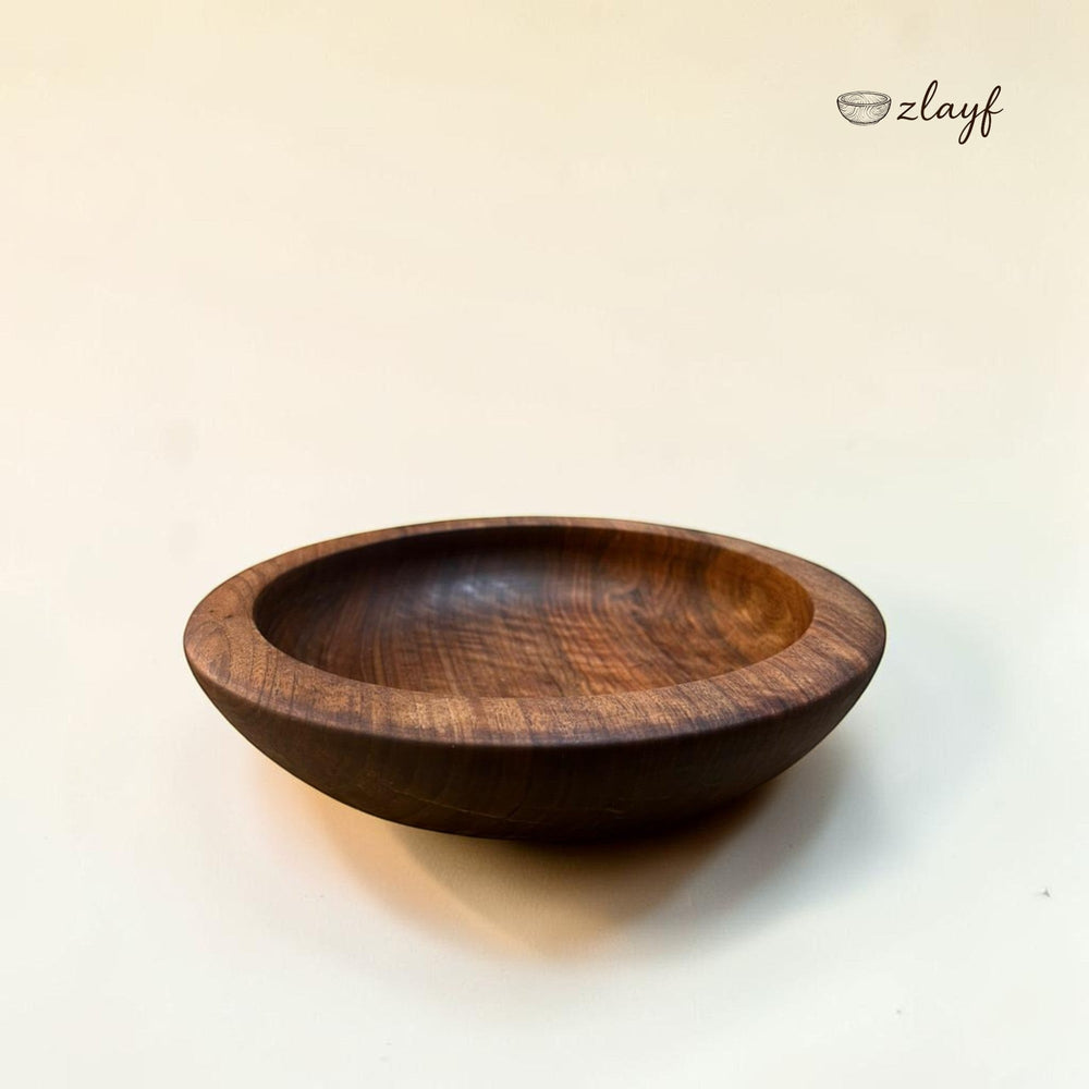 Zlayf handcrafted dark walnut wood serving bowl with natural grain and polished finish.