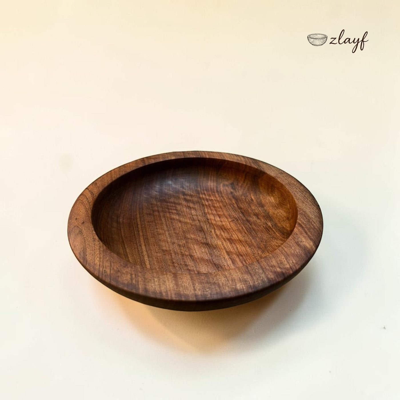 Zlayf handcrafted dark walnut wood serving bowl with natural grain and smooth finish, perfect for snacks or decor.