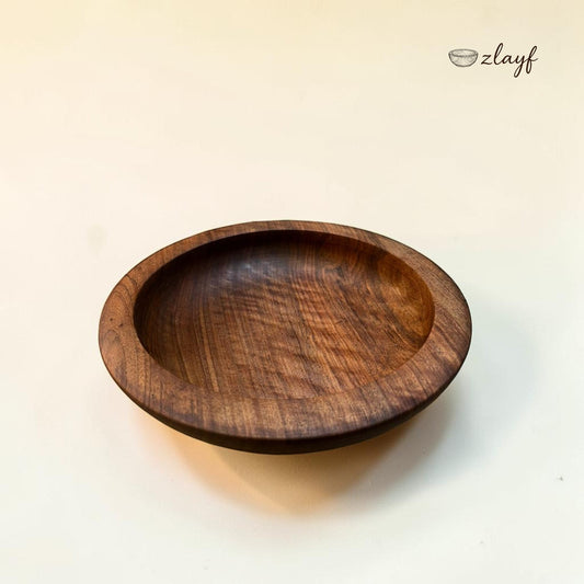 Zlayf handcrafted dark walnut wood serving bowl with natural grain and smooth finish, perfect for snacks or decor.