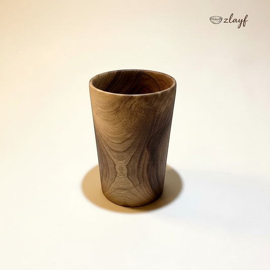 Zlayf dark wood tumbler with unique grain patterns and tapered design. Perfect for coffee or spirits.